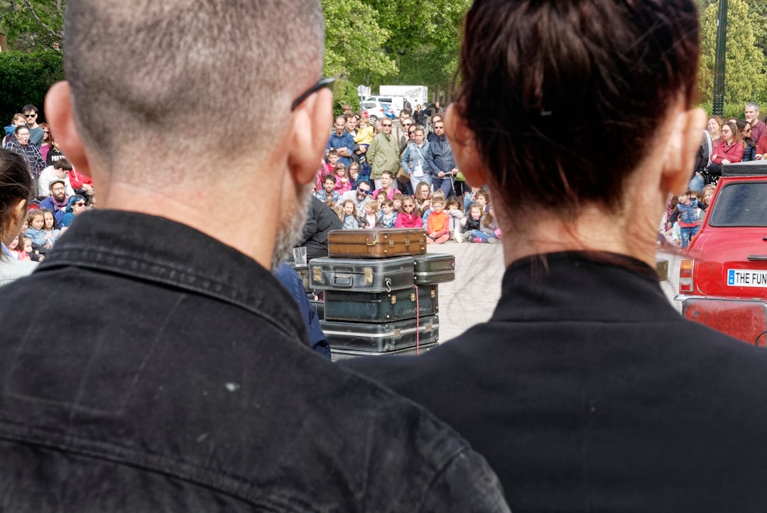a man and woman wearing black